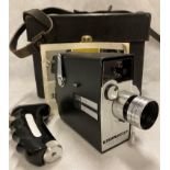 A Bell & Howell Auto load 300m reflex 8mm 'Electric Eye' cartridge load cine camera complete with
