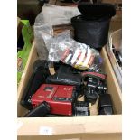 Contents to cardboard box - wood plate camera parts, filters, lenses, JVC tape camcorder,