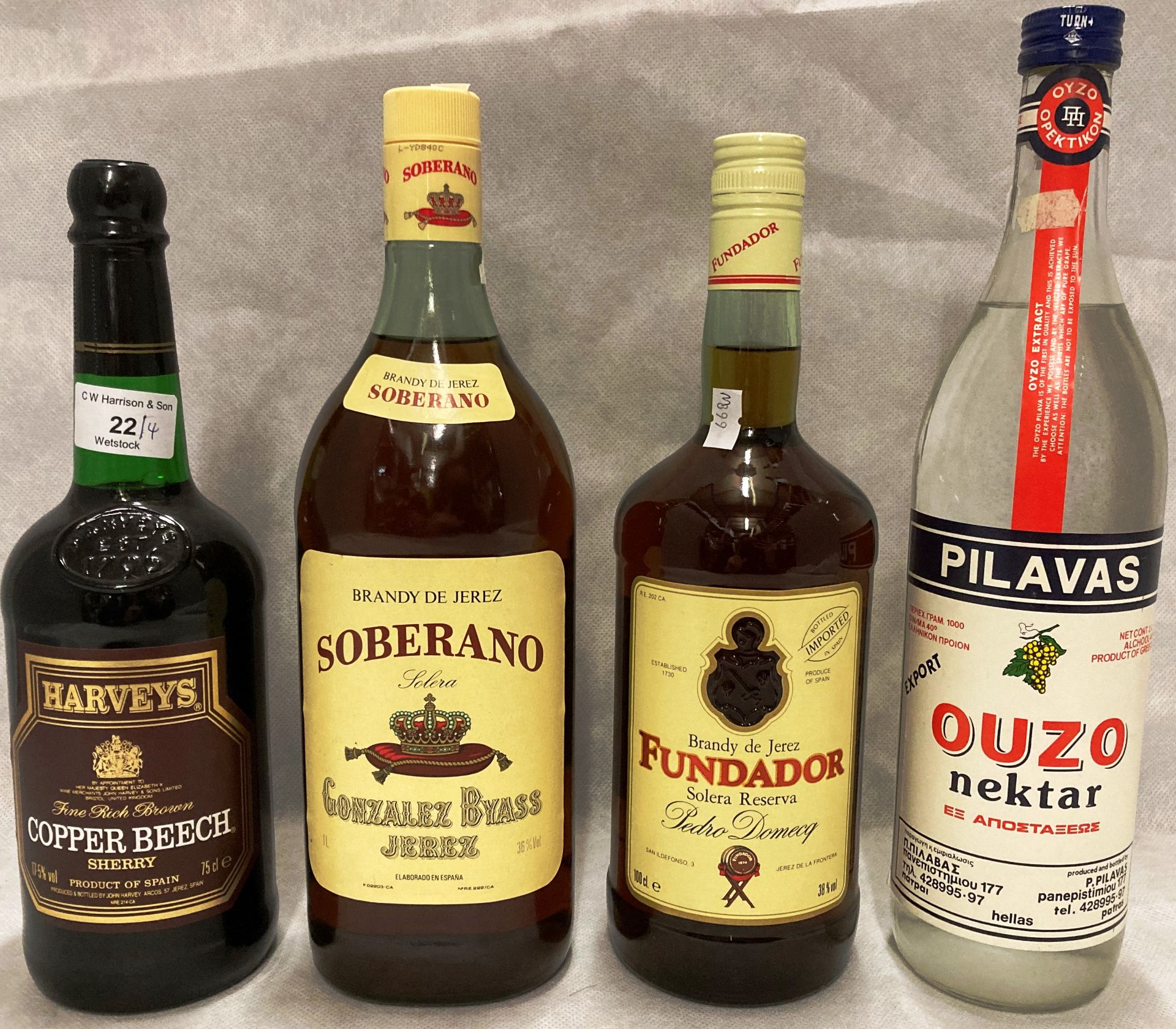 Four items - a one litre bottle of Soberano Brandy De Jerez (36% vol),