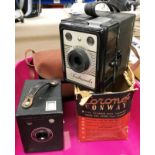 Contents to tray - a Coronet Conway box camera and a Kodak Six-20 Popular 'Brownie' box camera in