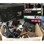 Contents to cardboard box - camera accessories, a DB Power LED light source, mini projector etc.