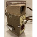 A Bell & Howell 624 8mm cine camera in brown case