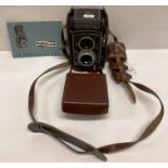A Franke and Heidecke Rolleicord DBP DBGM camera S/N 1920439 with brown leather case and manual