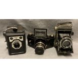 Three various cameras including a Conway Popular box camera in canvas case,