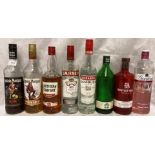 Eight part bottles spirits and liqueurs (1/4 to 3/4 full) - Gordons Gin, Captain Morgan Rum,