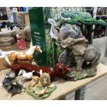 An Academy Mighty Tusker resin elephant figurines complete with box, a Beswick horse and foal,