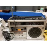 A Bush 6080 MW/LW/FM radio - cassette recorder