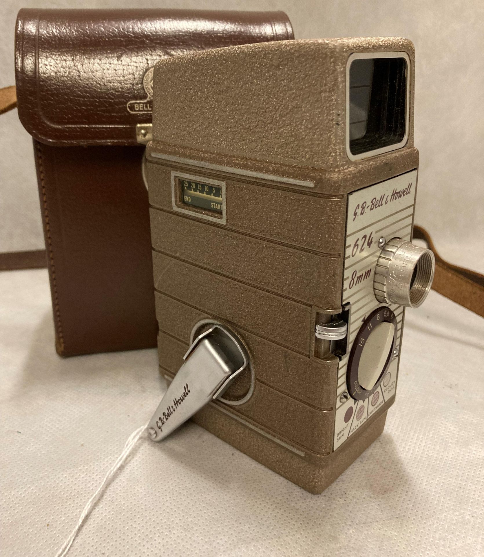 A Bell & Howell 624 8mm cine camera in brown case