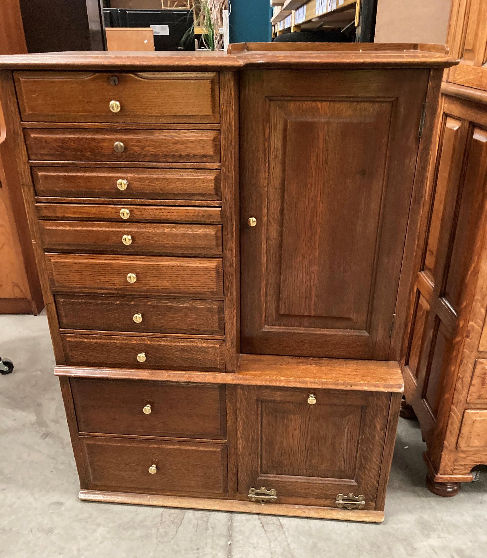 AN OAK TABLE TOP DENTAL CABINET with ten various sized drawers with brass handles and a recessed - Image 7 of 7