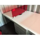 White steel framed double sided desk pod with two 3 drawer white metal mobile pedestals and a red