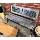 A metal framed bench with wood slats 124cm long