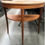 A Legate Furniture teak half moon hall table with undershelf 77cm and a light brown patterned low