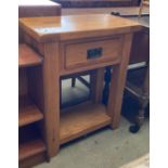 A light oak single drawer side table with undertray 60 x 76cm high