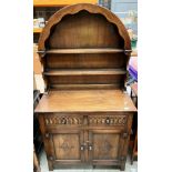 A Bevan Furnell Reprodux oak Dutch style dresser with two plate rack top over two door two drawer