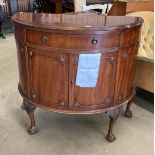 A mahogany demi lune single drawer two door cabinet on claw and ball feet 100cm