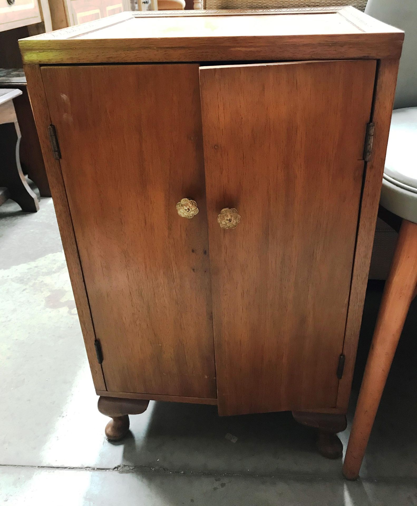 A light oak single drawer single door bedside cabinet,