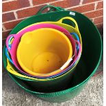 A yellow plastic bucket and a quantity of various sized rubble/garden buckets