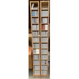 Two oak finish CD racks each 20cm x 17cm x 205cm high complete with approximately 300 CD's and CD