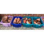 Contents to four plastic crates - assorted terracotta plant pots (some broken/damaged - crates not