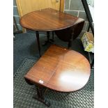 A mahogany gate leg drop leaf oval side table 82cm x 140cm when open together with a matching low