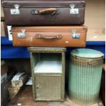 A green Lloyd Loom armchair, bedside cabinet,