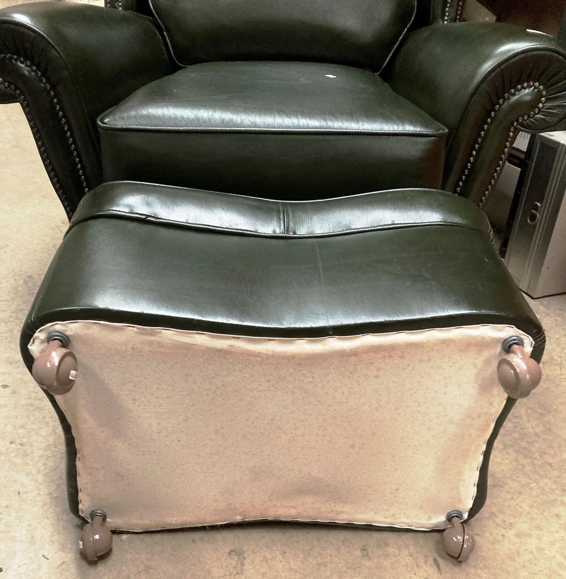 A dark green leather wing back armchair with matching pouffe - please note no fire certificates, - Image 2 of 2