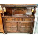 An oak buffet sideboard with single door top section over two drawer two door base 142 x 138cm high