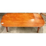 A walnut finish coffee table 92 x 39cm and a wood framed ironing board