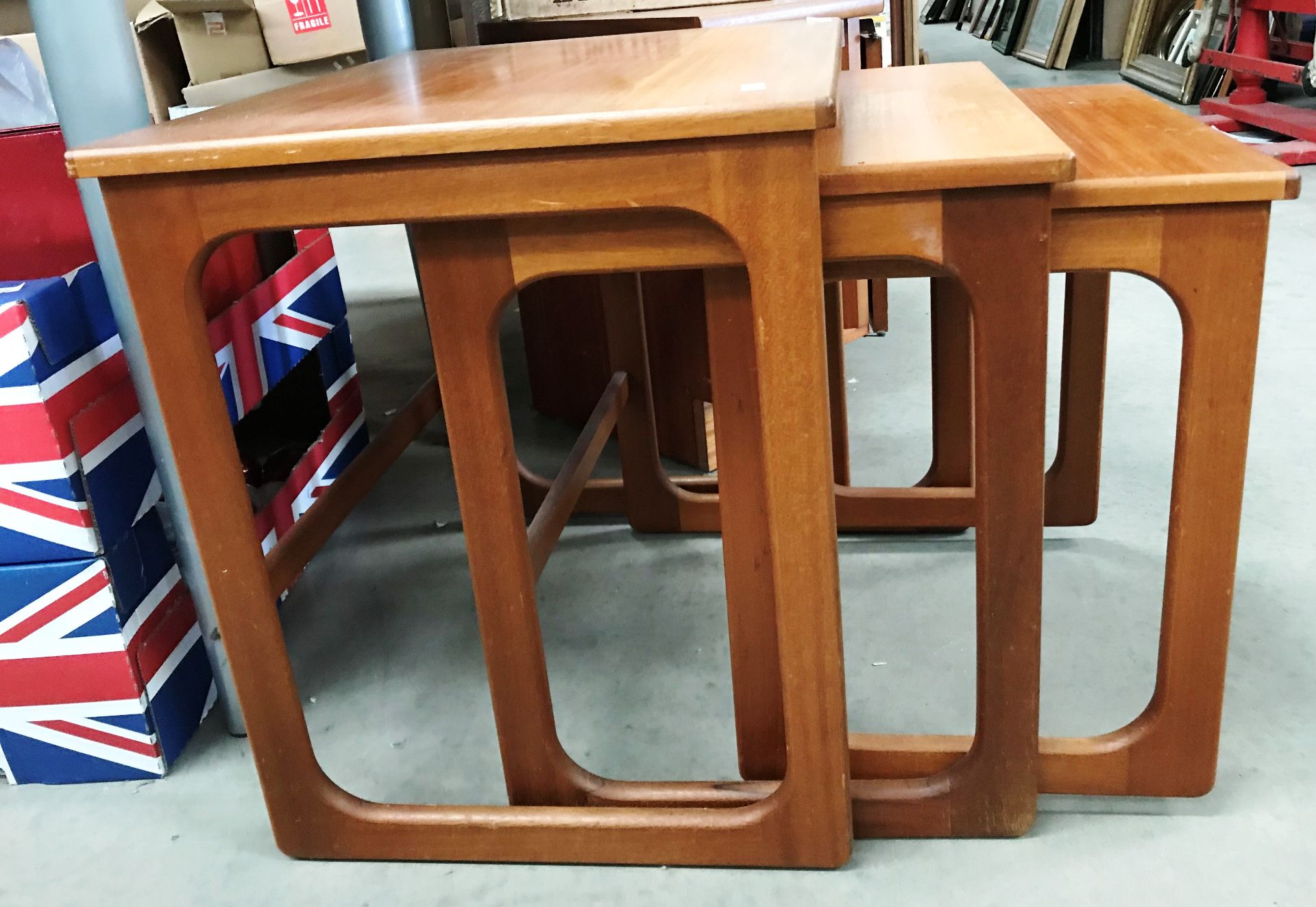 A McIntosh nest of three coffee tables and a teak entertainment stand in the style of Nathan - Image 2 of 3