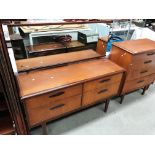 A teak four drawer chest of drawers 77cm x 92cm high and a matching four drawer mirror back