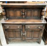 An oak buffet sideboard with two door top section over two drawer two door base 124cm x 124cm