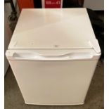 A Curry's CTF34W18 Essentials table top freezer complete with manual