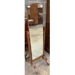 An oak framed cheval mirror