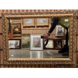 Large ornate gilt framed wall mirror with bevelled edge,