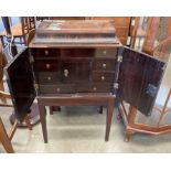 A LATE 18th CENTURY ROSEWOOD CAMPAIGN WRITING CABINET with lift top over two doors which reveal a
