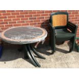 A green plastic patio table 105cm dia and four matching armchairs (5)