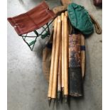 A kit bag containing a Slazenger Gradidge 'Len Hutton' child's cricket bat, six cricket stumps,