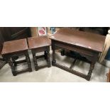 An oak set of three coffee tables and a small oak drop leaf side table (chip to one drop leaf) (2)