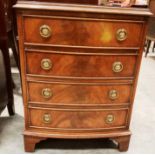 A small mahogany bow front chest of four drawers 45 x 62cm high