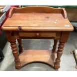 A reproduction pine side table with frieze drawer 60cm