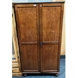 An oak two door wardrobe 92cm x 173cm high