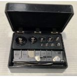 A set of Griffin and George balance scales weights in black bakelite case