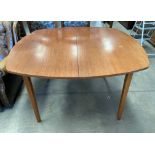 A teak 'D' ended extending dining table 112 x 167cm extended