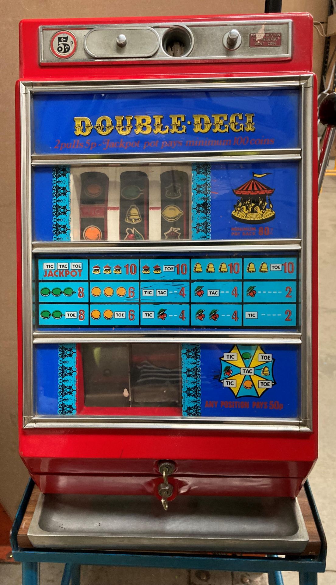 A VINTAGE DOUBLE DECI FRUIT MACHINE side handle approx,