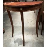 A mahogany finish demi lune hall table,