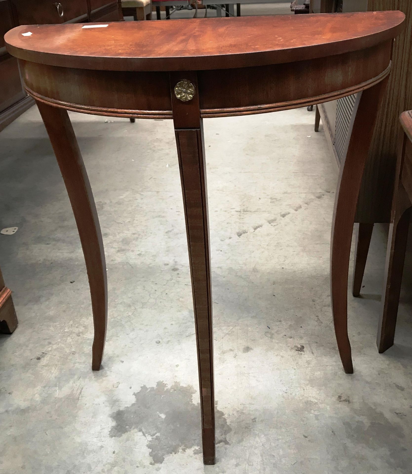 A mahogany finish demi lune hall table,