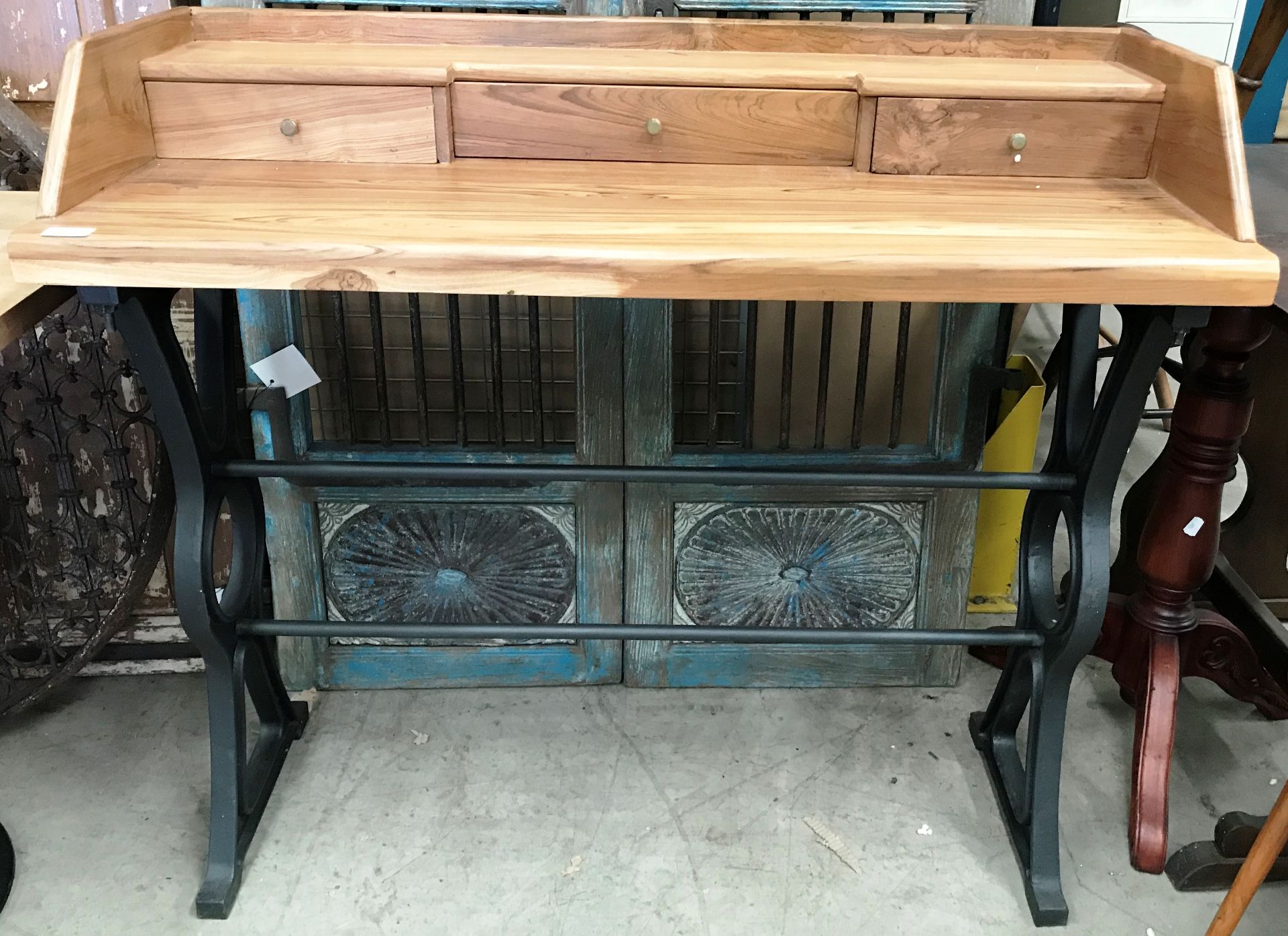 Acacia wooden topped desk on black cast metal base with three drawers 106 x 45 x 95cm high