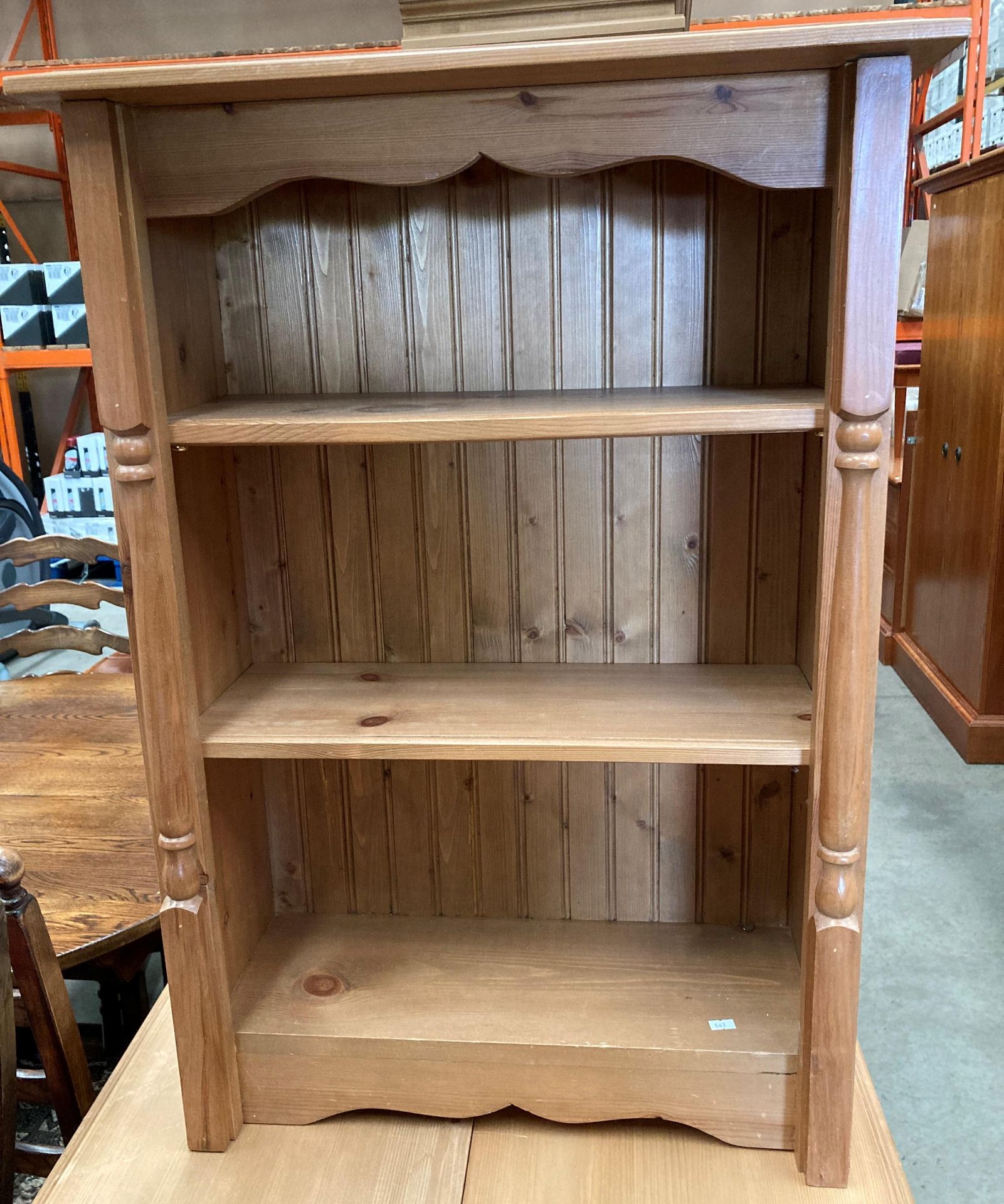 A small pine three shelf open bookcase 60 x 86cm high