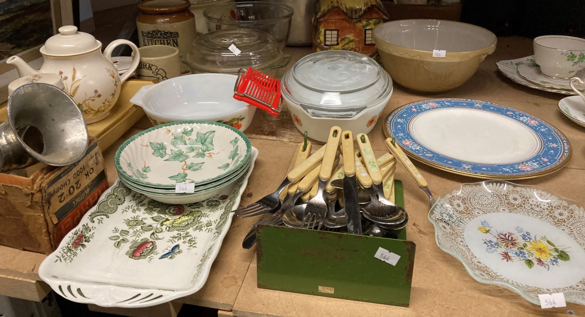 Assorted kitchen ceramics, Pyrex dishes, mixing bowl, table mounted hand mincer, etc.