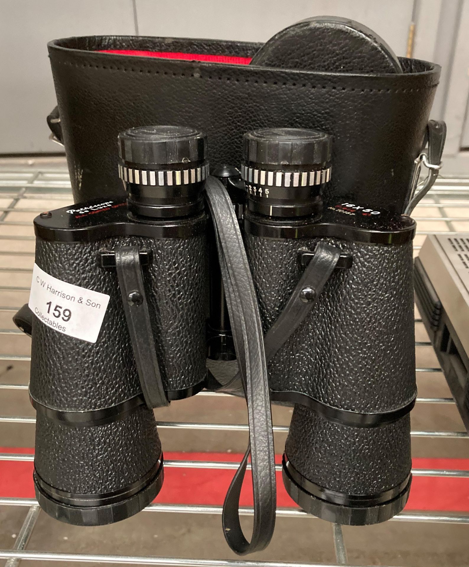 A pair of Pathescope De Luxe 16x50 binoculars complete with case (lid broken)